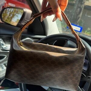Celine
Triomphe cloth handbag